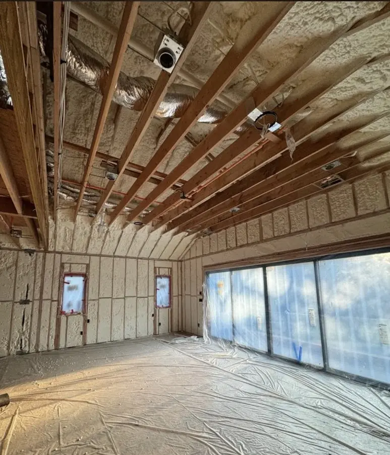 Interior walls and ceiling insulated with spray foam during new construction in Schofield Barracks